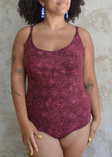 Las Flores Bodysuit - organic cotton bodysuit with cross back straps and beautiful floral print