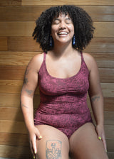 Las Flores Bodysuit - organic cotton bodysuit with cross back straps and beautiful floral print